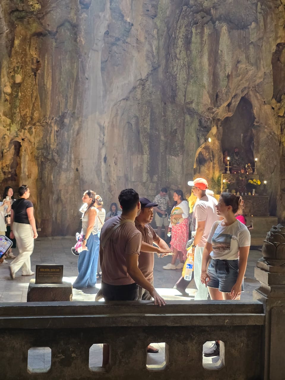 Visitors at a pagoda gate in the Marble Mountains, Da Nang